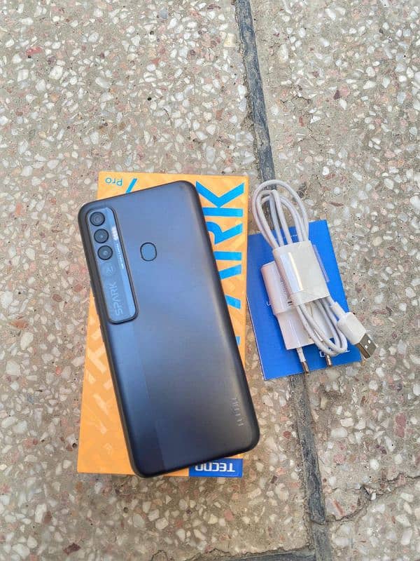 TECNO SPARK 7 pro 4/64 WITH BOX charger 1