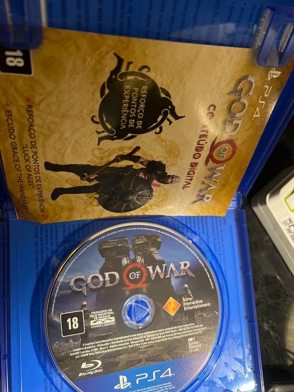 Gta 5 premium  + God of war 4 ( ps4) 3