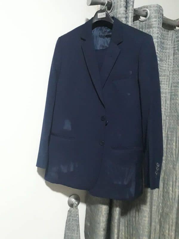 2 suits 1 black and 1 navy blue 6000rs each 2