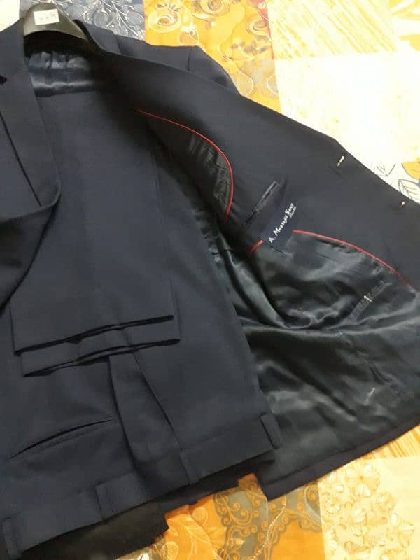 2 suits 1 black and 1 navy blue 6000rs each 9