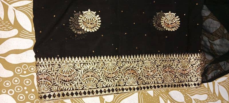 beautifully black sarhii with golden work 5