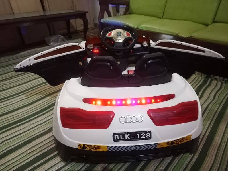 Audi kids car imported with Remotecontrol , Running condition All ok 10