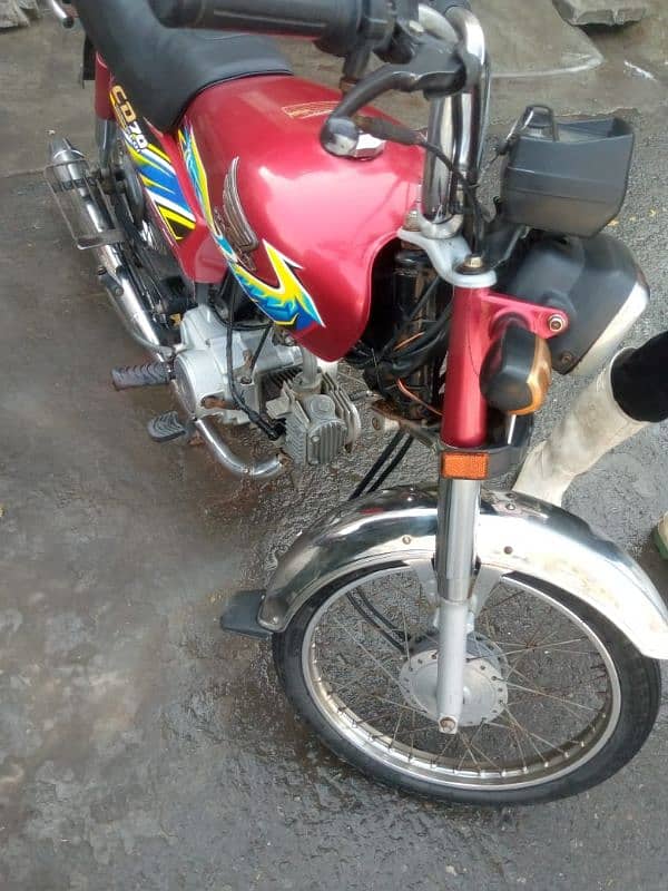 Honda 70 21 model copy later ok koi km ni Hona wala 03038356796 1