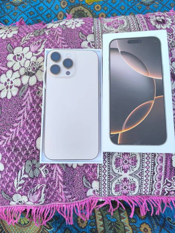 I phone 16 pro max noon pta desert titanium full box 10/ 10. 2