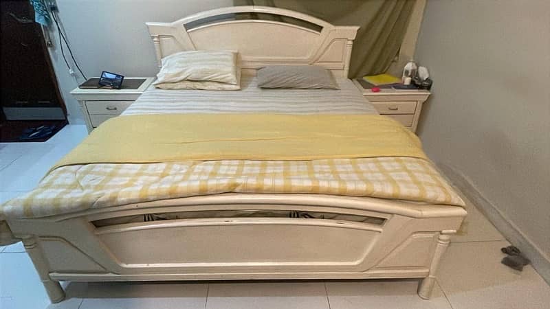 Used King bed in good condition, real wood. 1