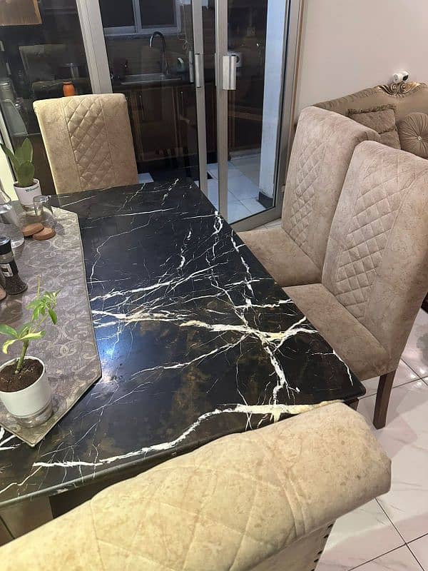 marble dining table with 6 comfortable chairs 1