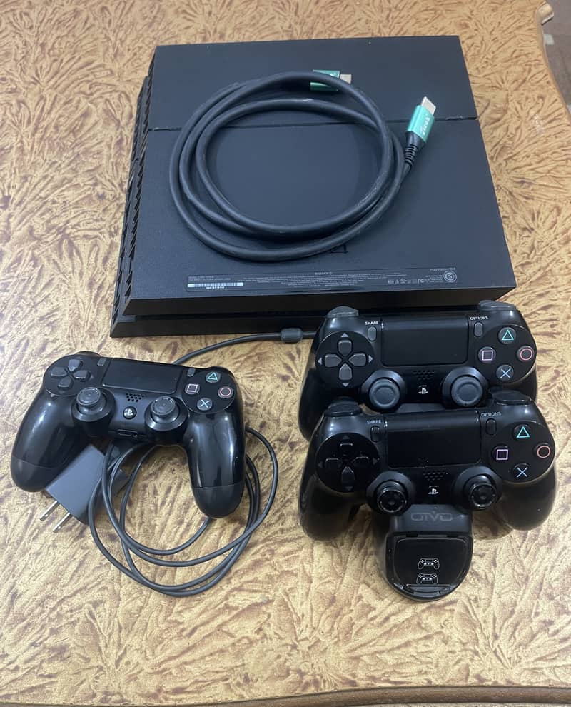 PS4 (PlayStation 500gb) with 3 remotes 0