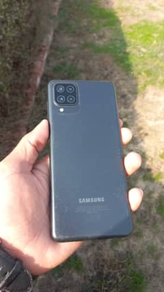 Samsung A12   10/10 condition. . one handed used