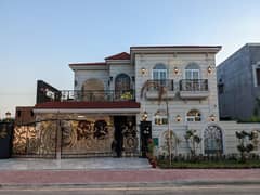 A BEAUTIFUL 1 KANAL HOUSE FOR SALE IN SHAHEEN BLOCK SECTOR B BAHRIA TOWN LAHORE