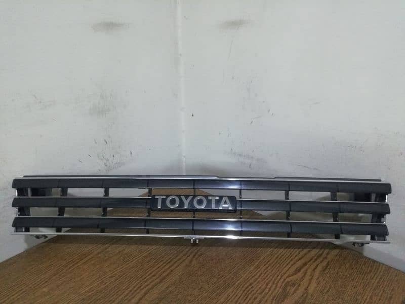 TOYOTA COROLLA AND SPRINTER 1987-91 GENUINE FRONT GRILLE 7