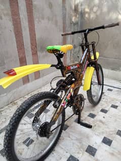 cycle in yellow black colour