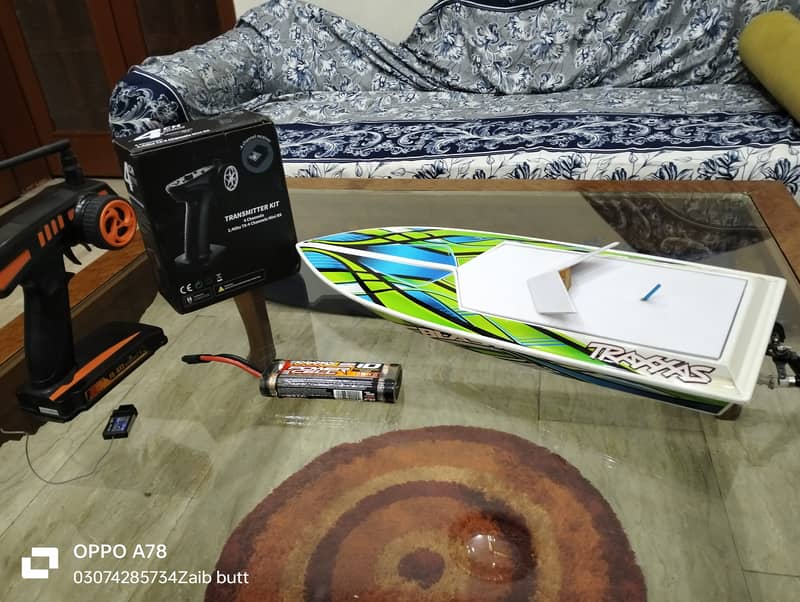 Electric Traxxas boat with battery charger transmitter and receiver 0