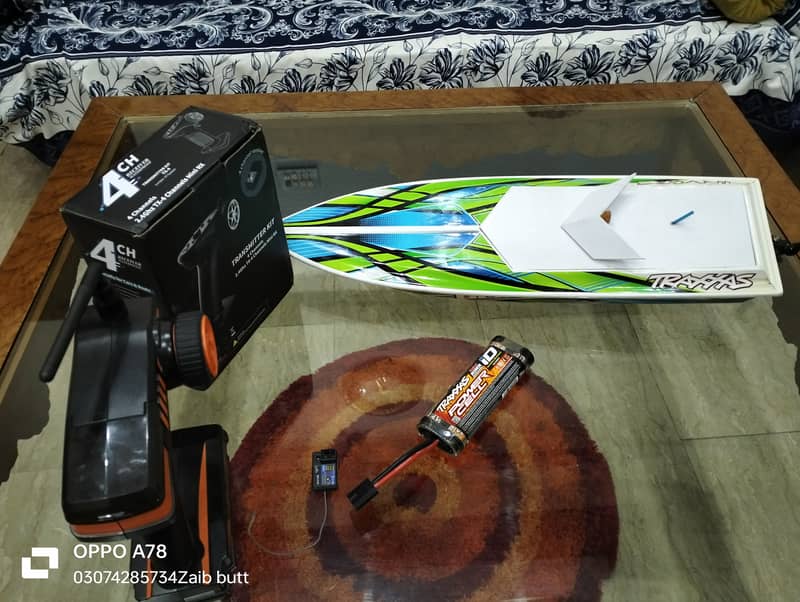 Electric Traxxas boat with battery charger transmitter and receiver 2