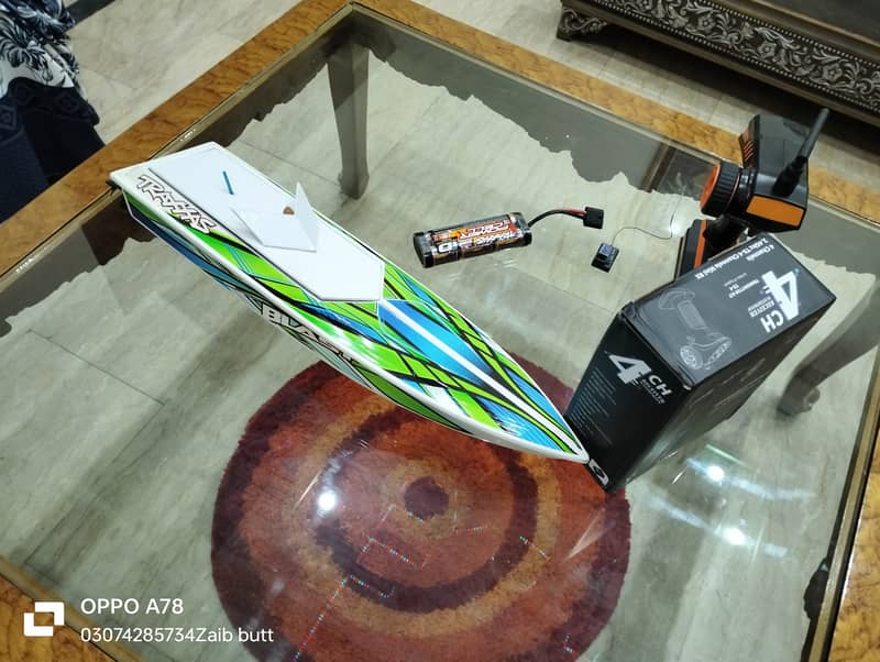 Electric Traxxas boat with battery charger transmitter and receiver 3