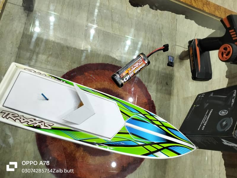 Electric Traxxas boat with battery charger transmitter and receiver 5