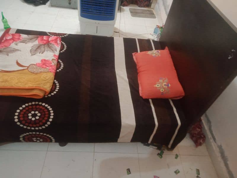 wooden medium sized bed with mattress 2