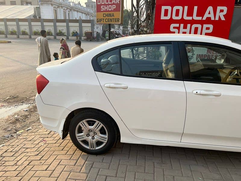 Honda city color white 2015 model. location askari 10 0