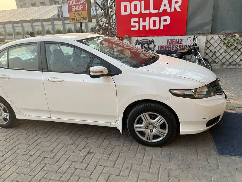 Honda city color white 2015 model. location askari 10 1