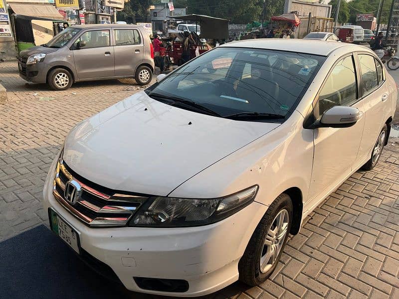 Honda city color white 2015 model. location askari 10 5