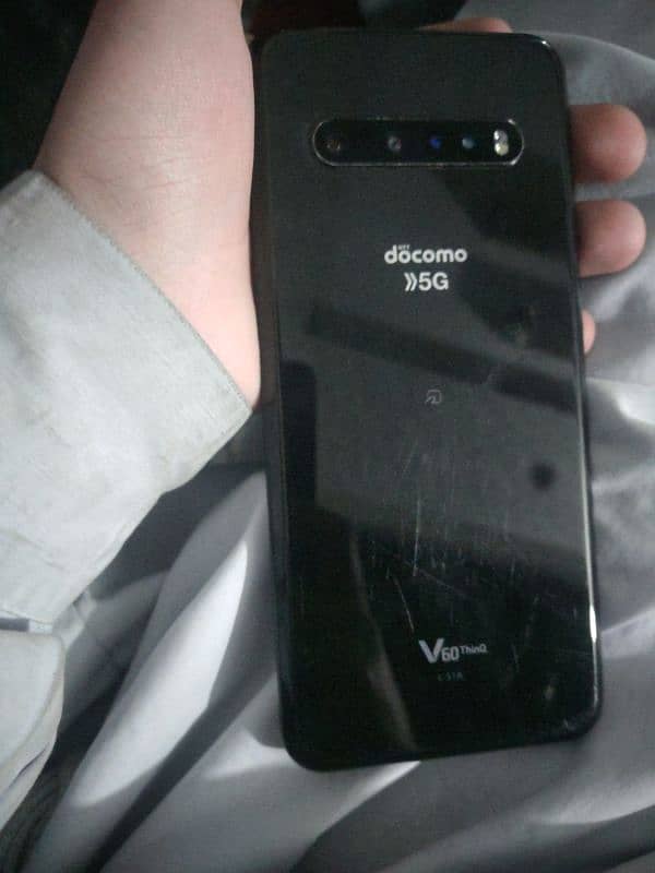 lgv60 thinq 5g non pta Black  colour. Minor scratches on back 4