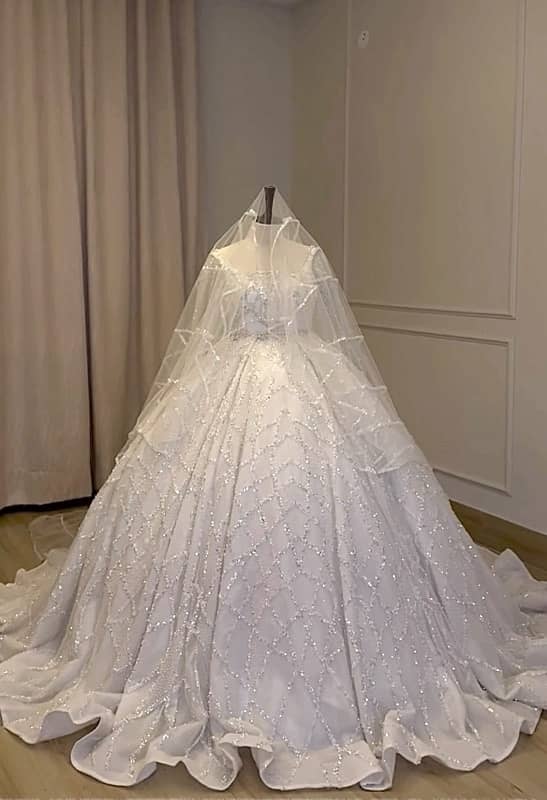 Beautiful white wedding dress from UAE 0