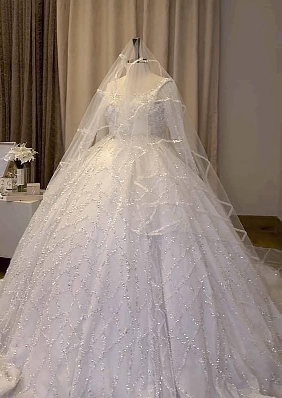 Beautiful white wedding dress from UAE 4