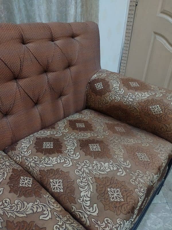 2 seater brown sofa 1