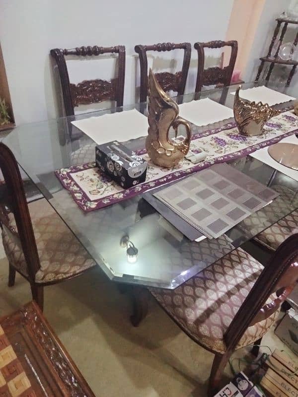 8 sitting chairs n 1 glass table 4