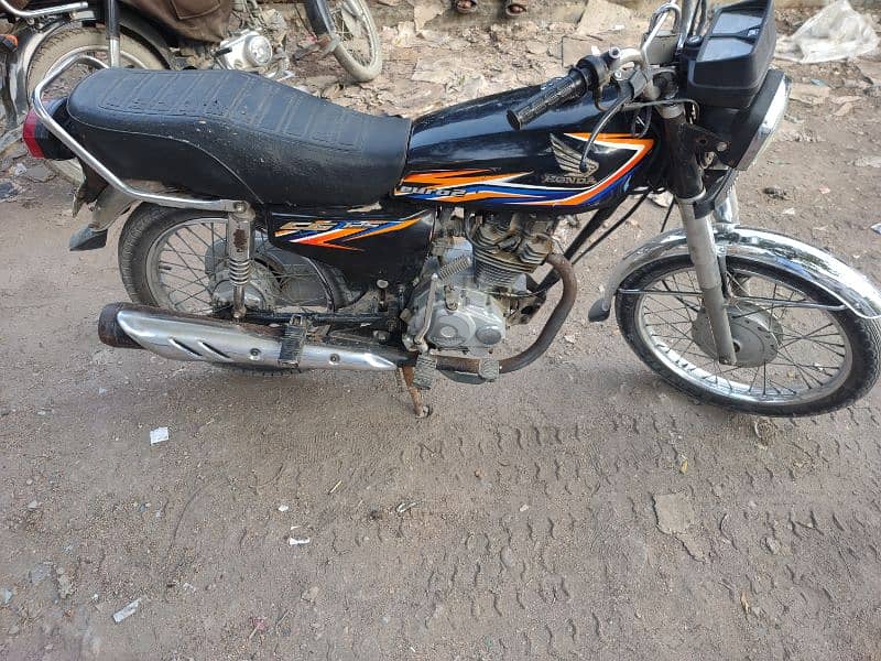 Honda 125 Karachi number first owner 4