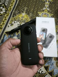 Insta 360 X3 with invisible stick.