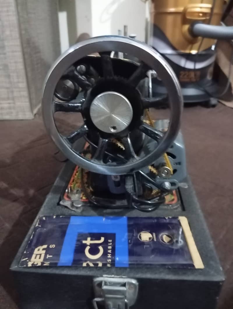 G. F. C Sewing machine with motor and cover 1