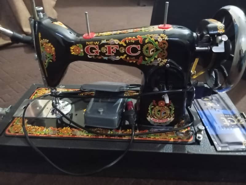 G. F. C Sewing machine with motor and cover 2