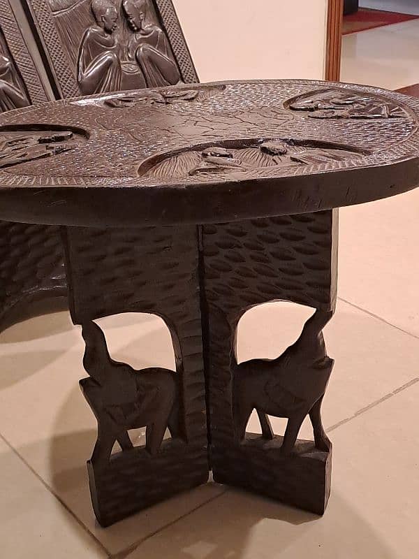 African carved wooden chairs 0