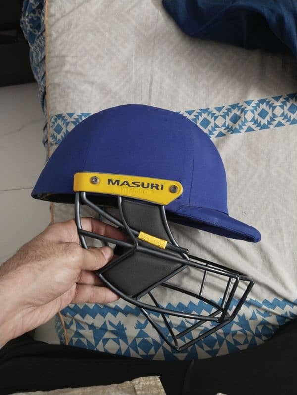 original Masuri titanium grill helmet mans small 0