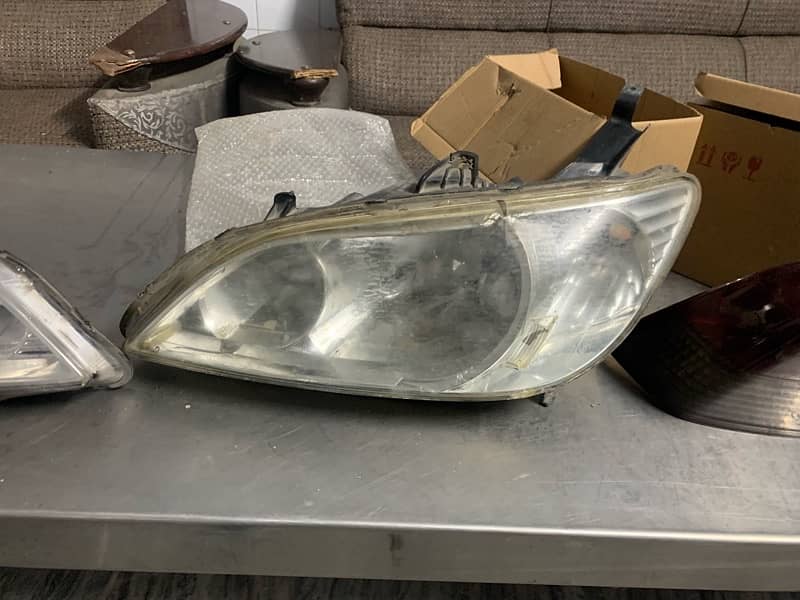 civic 2005 front light back light and left fender 2