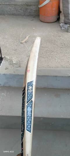 new hardball bat with new ball