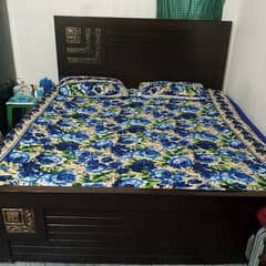 Wooden double bed