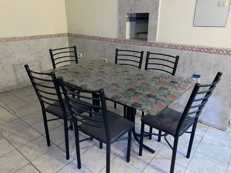 6 seater steel base dinning table 1