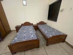 Pure wooden 2 single beds with new foams and 2 side tables