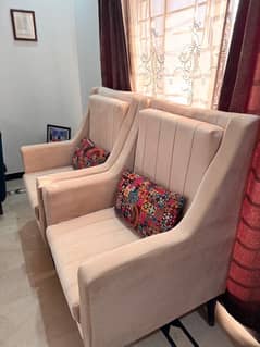 2 Sofa chairs for sale- Free coffee table and cushions