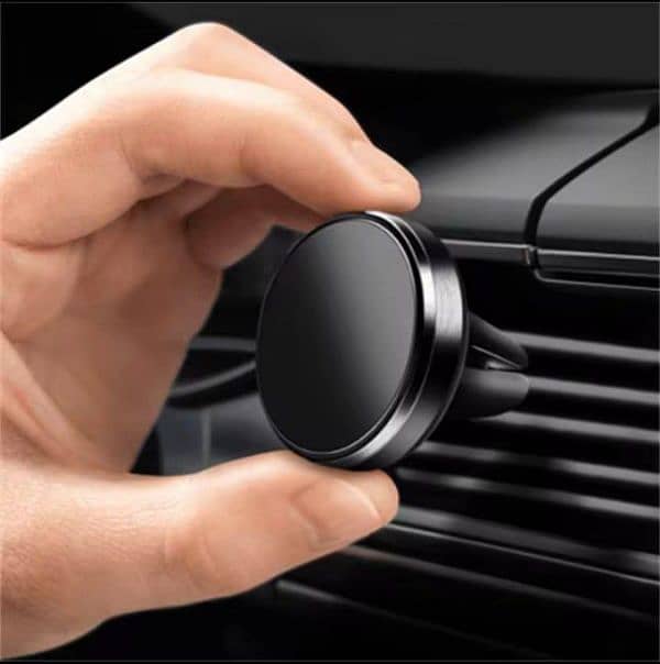 Mobile Magnetic Holder in cars etc. . . 0