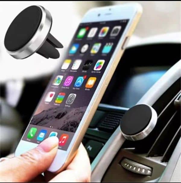 Mobile Magnetic Holder in cars etc. . . 1