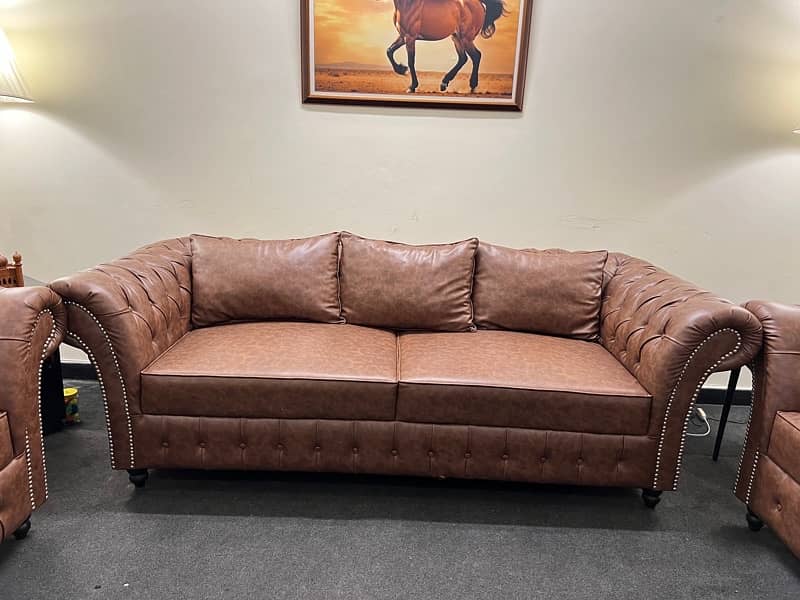 New Condition leather ragison Sofa 100% new condition (15 yr warranty) 4