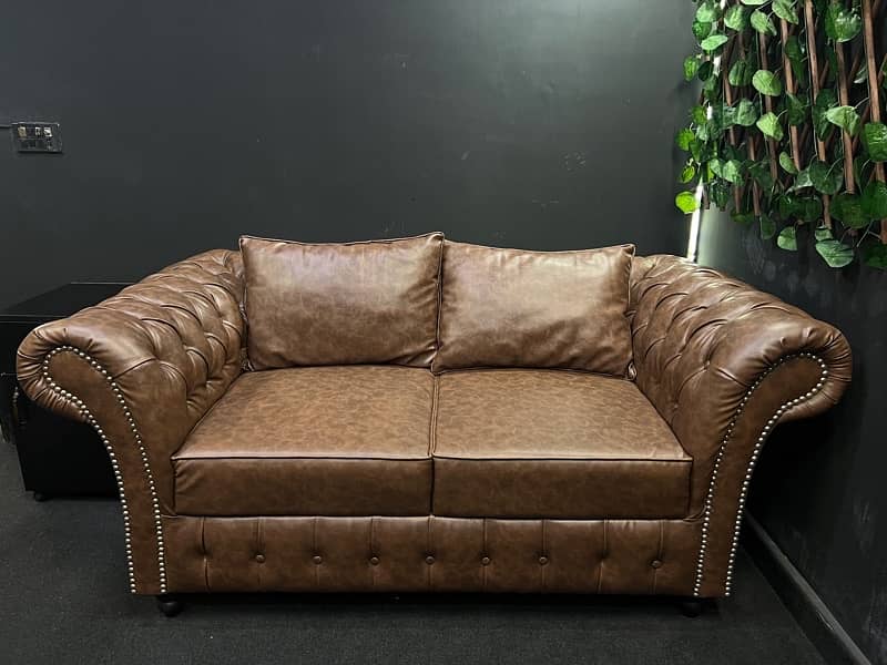 New Condition leather ragison Sofa 100% new condition (15 yr warranty) 9