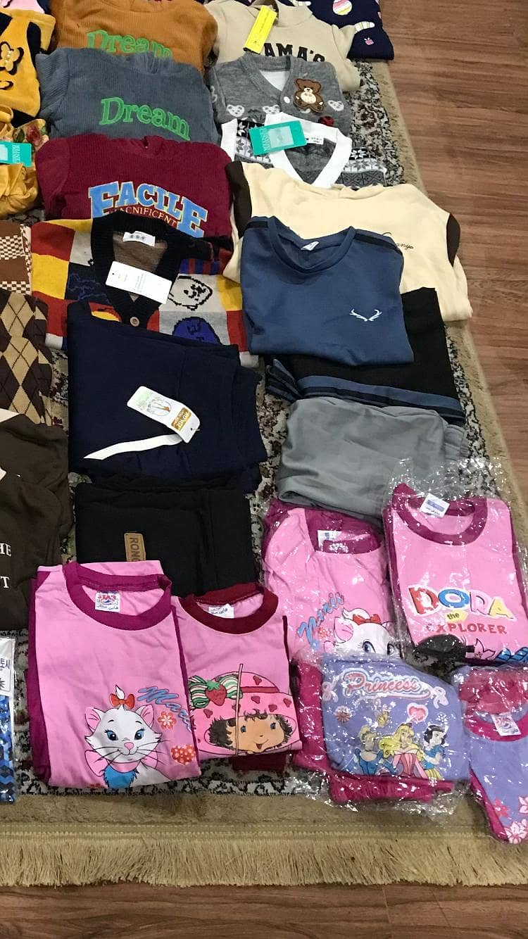 Lot of Dubai imported clothes for kids of different ages 3