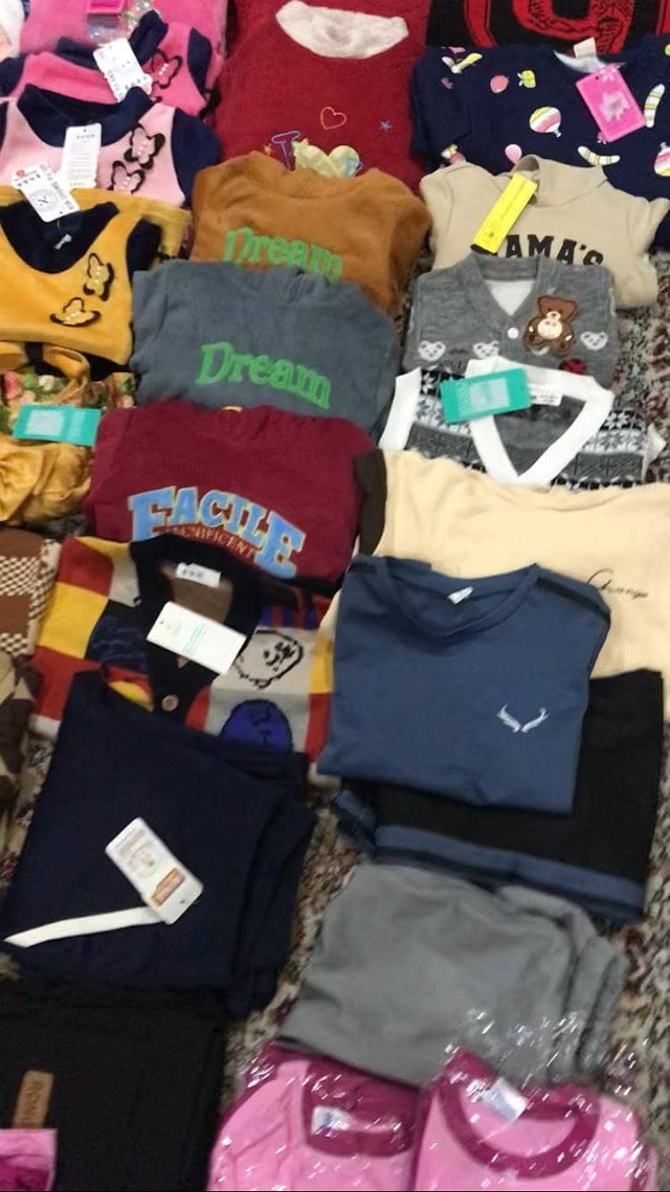 Lot of Dubai imported clothes for kids of different ages 7