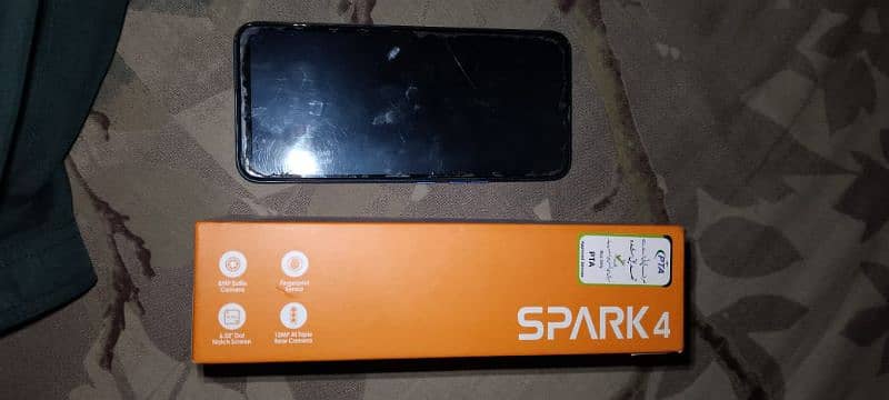 Tecno Spark 4 ha 3 , 32 ha 5