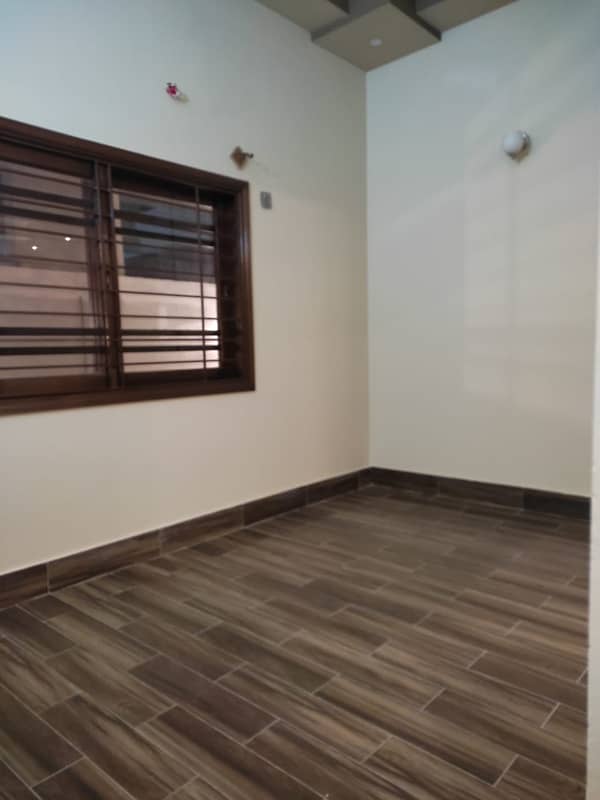 three bed dd first floor portion with roof for rent in johar 2