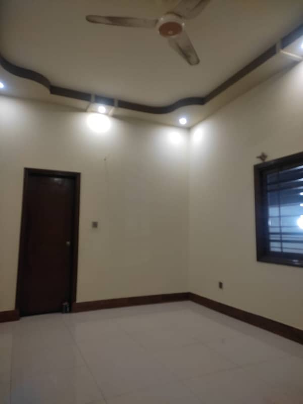 three bed dd first floor portion with roof for rent in johar 5