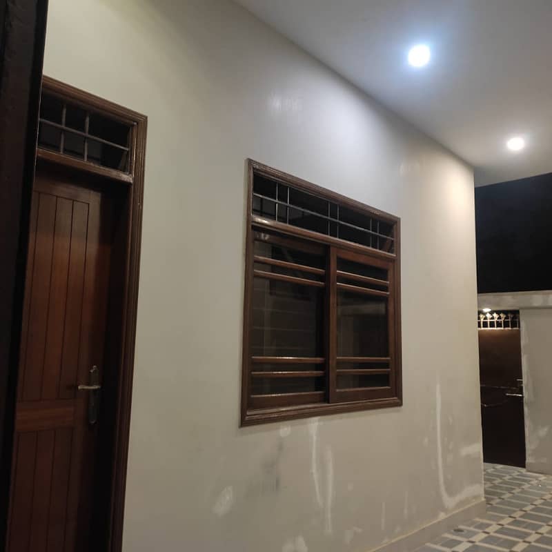 three bed dd first floor portion with roof for rent in johar 9